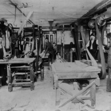 The original Matot dumbwaiter shop shown in black and white.